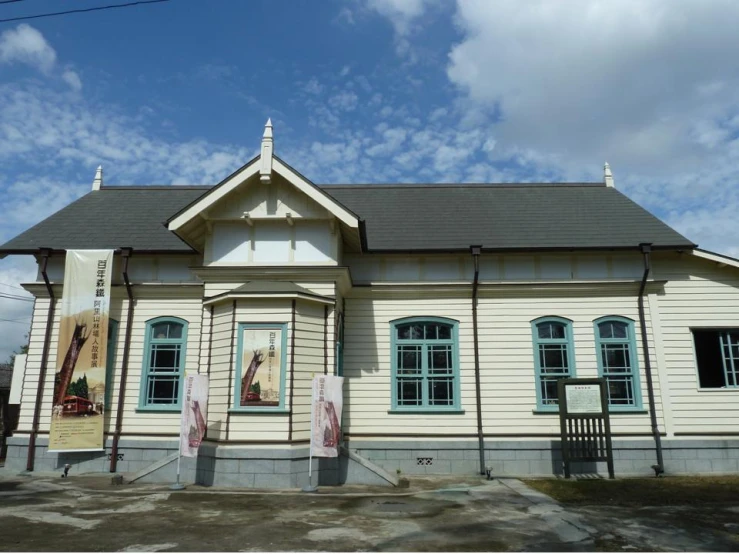 an old building sitting on the side of a street