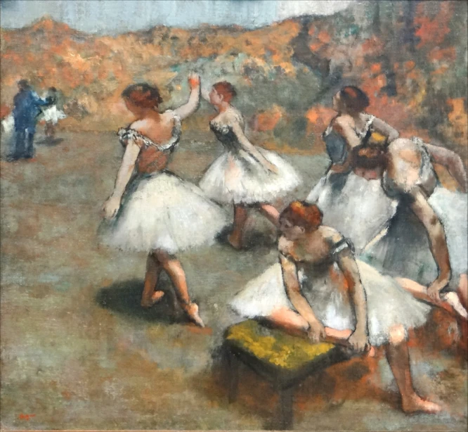 three young ballerinas dancing in an art class