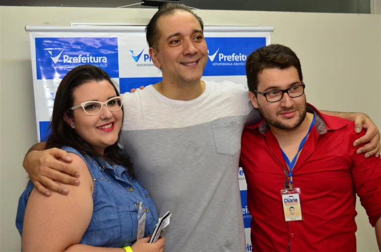 two men and two women posing for the camera