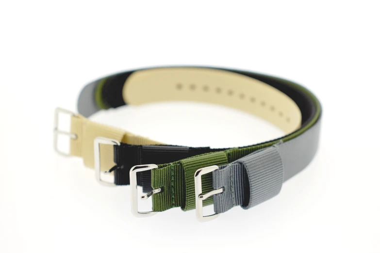 three color leather straps that are attached to the belt