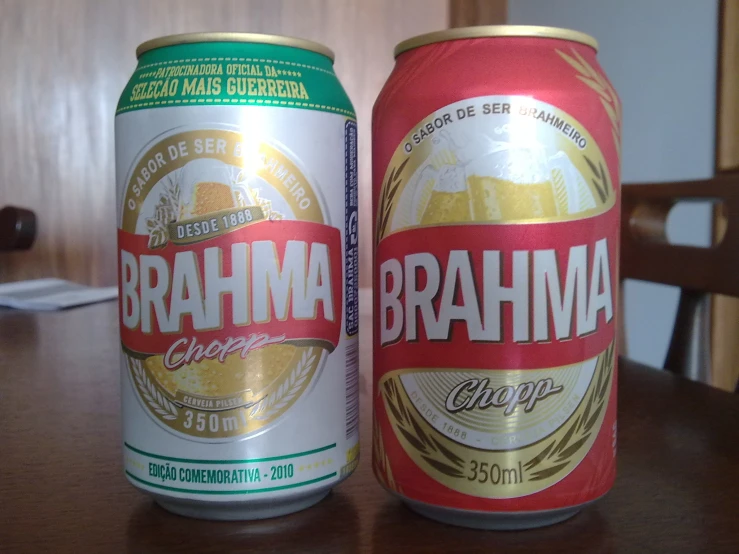 two bottles of hma beer, one has gold