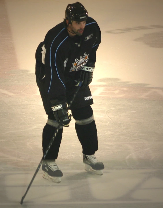 a person skating in the rink during the day