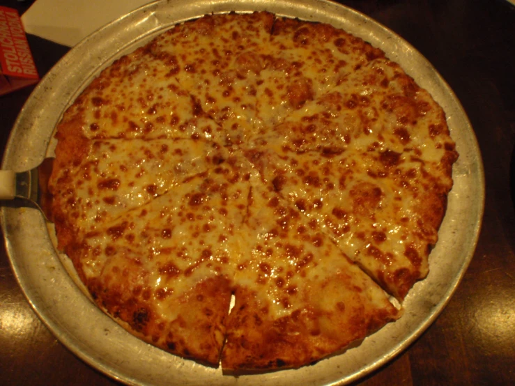 cheese pizza with the entire crust cut into four slices