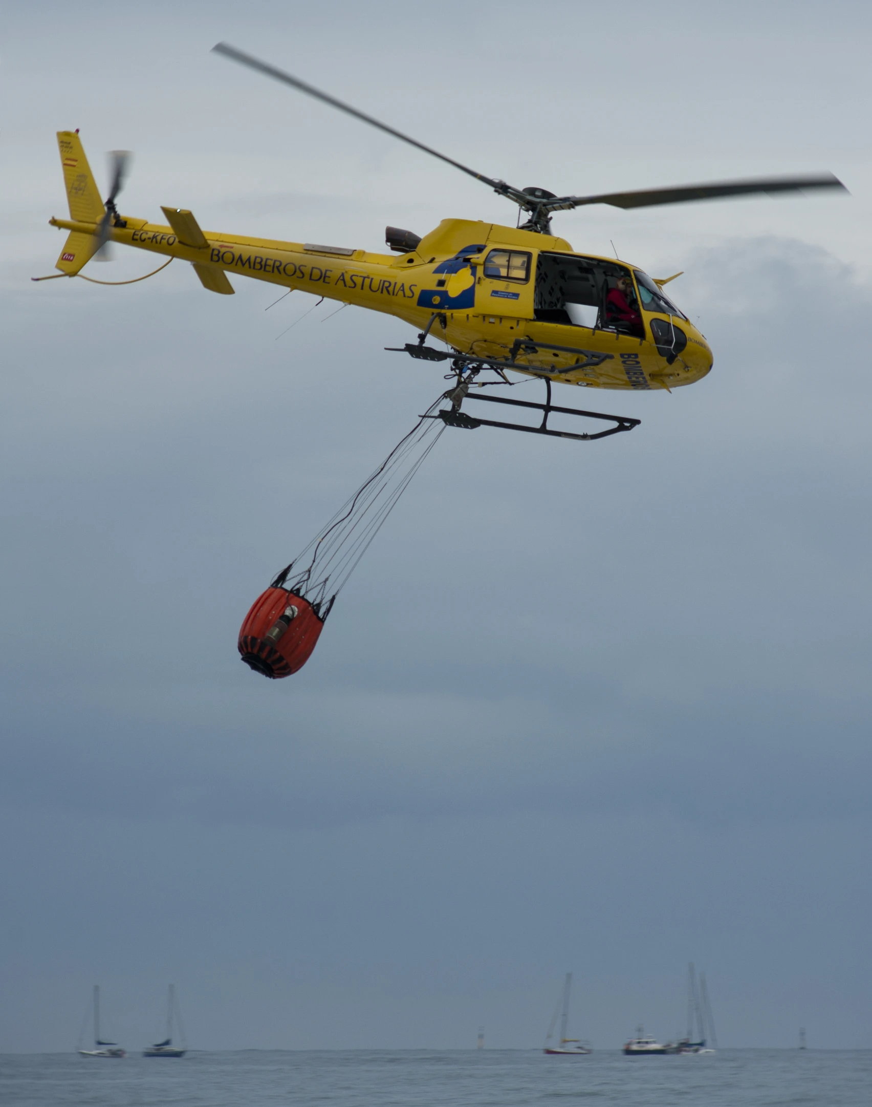 the rescue helicopter is using an orange device