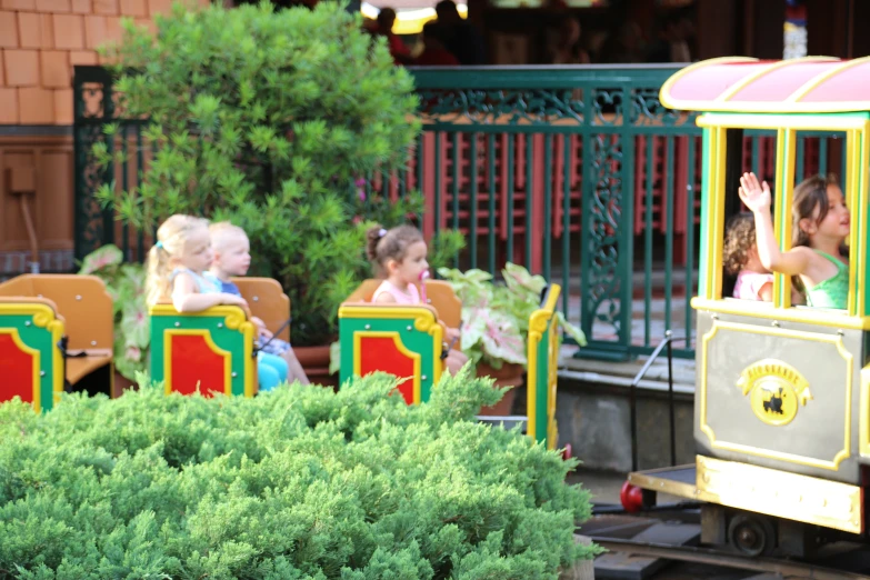 a train ride with s waving to each other