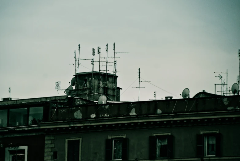 the roof of the building with antennas on top