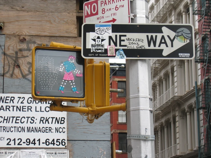 street signs for the intersection and no parking sign