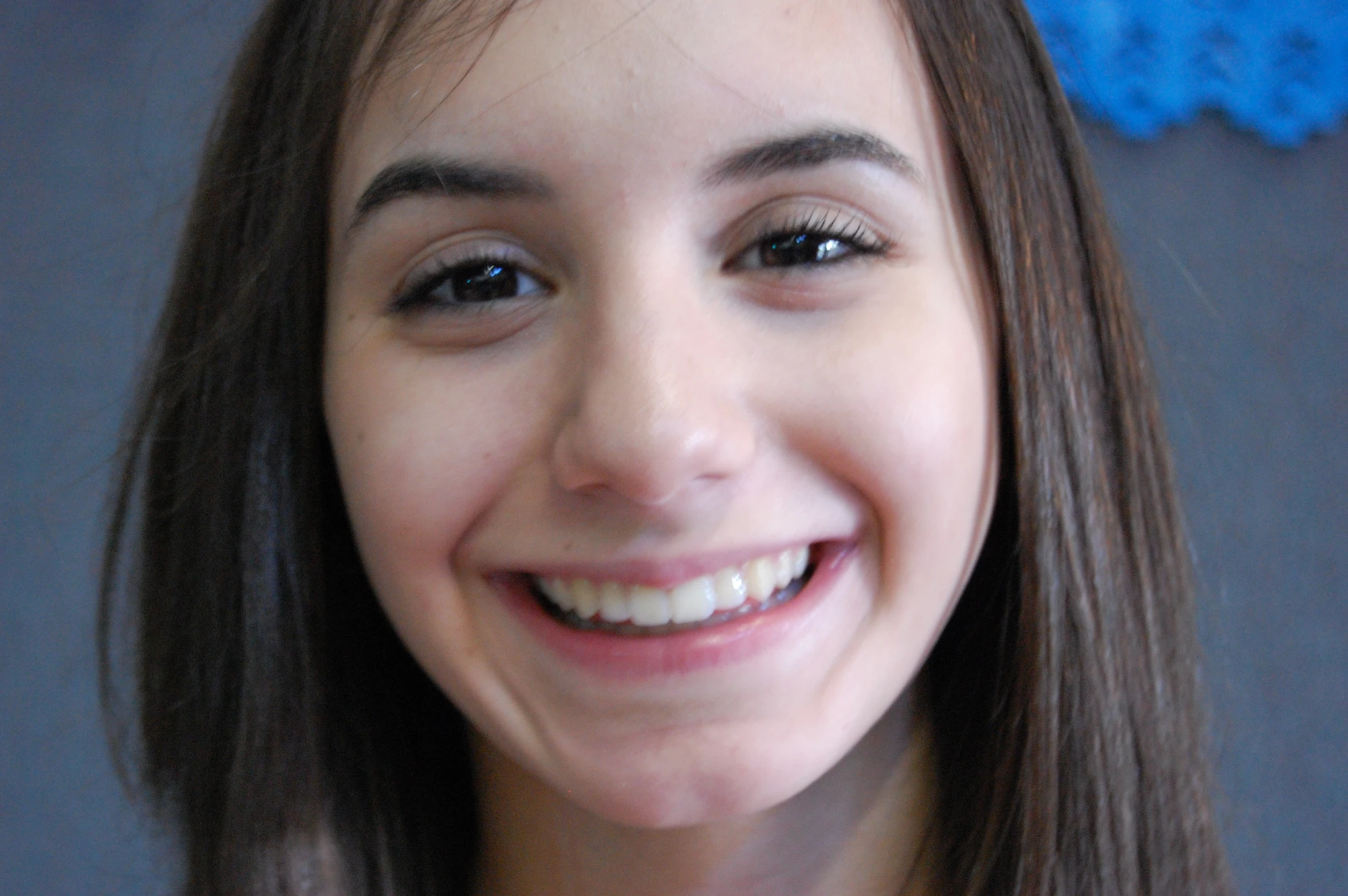 a close up image of a smiling woman