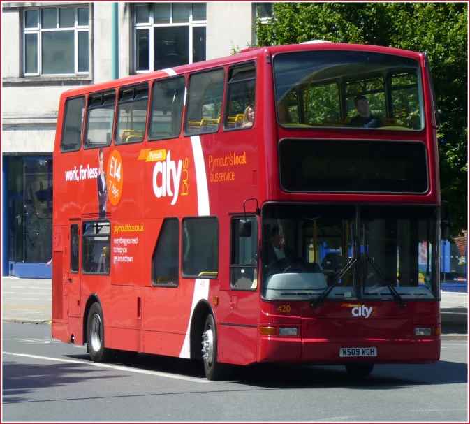 a double decker bus parked on the street