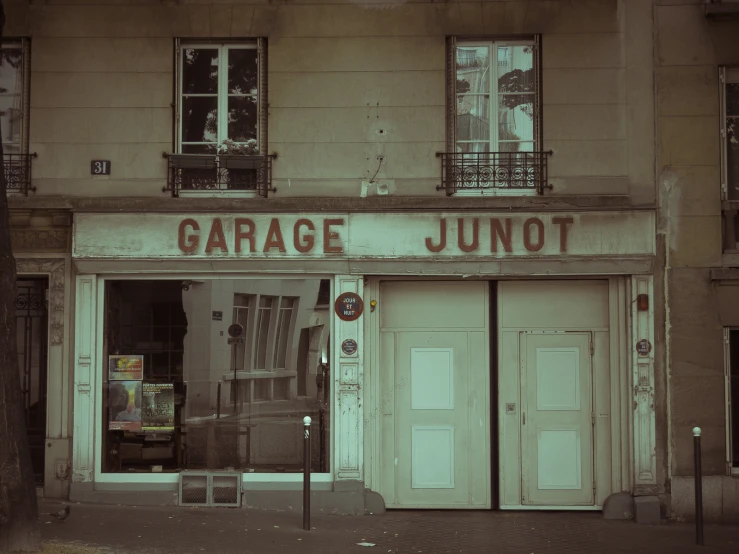 the doors to a garage are open in a building