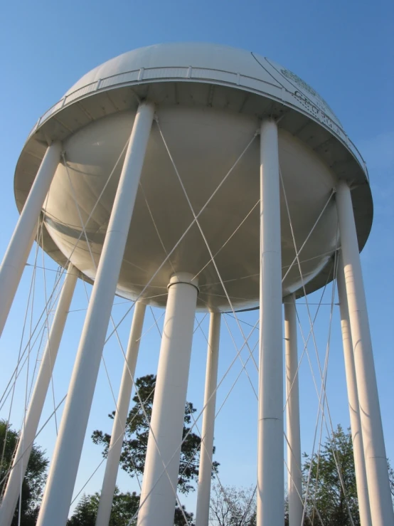 large water tower with a sky background