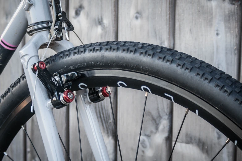 this is a closeup of the rear tire on a bicycle