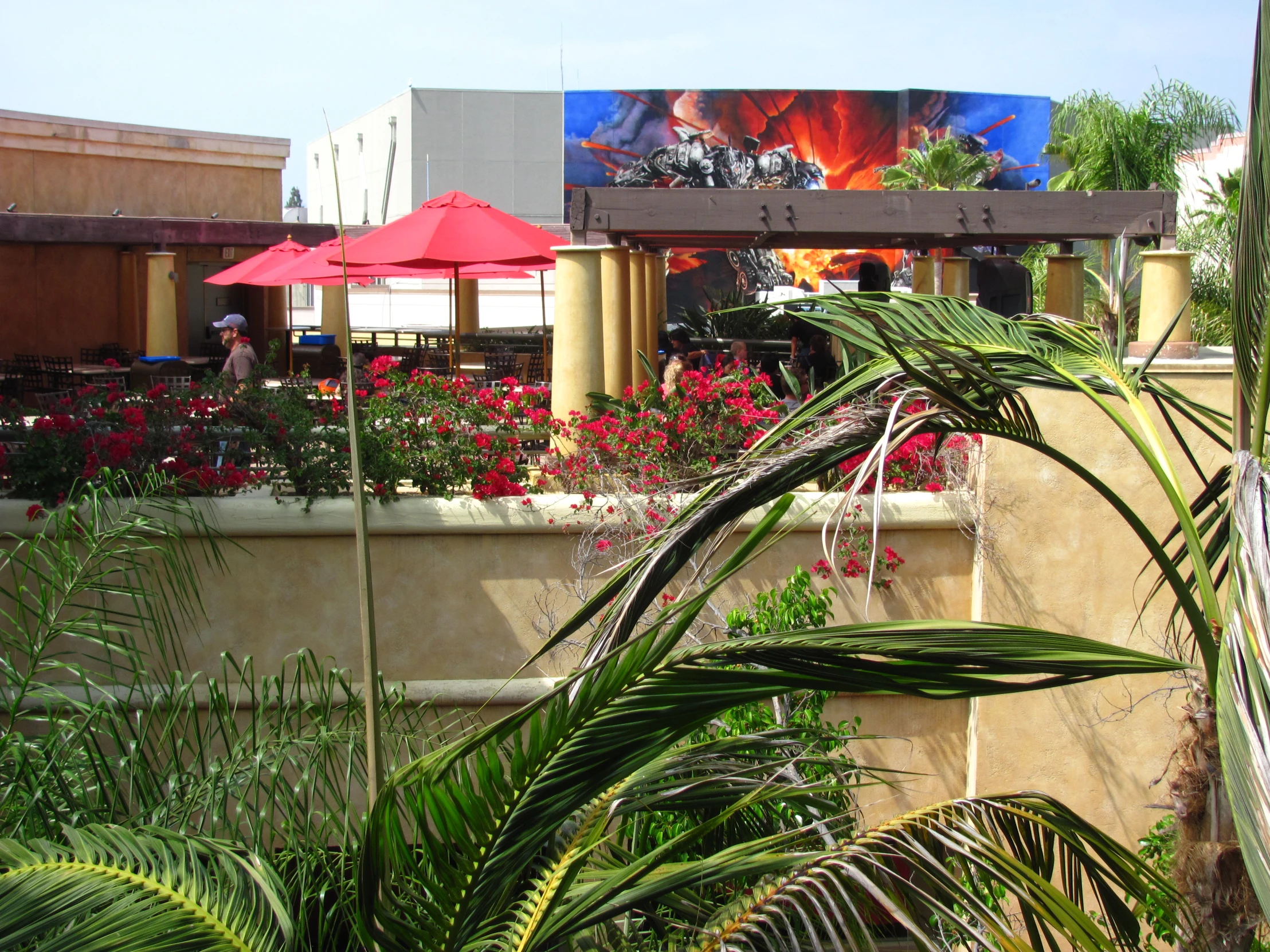 a picture of outdoor seating and tables with umbrellas