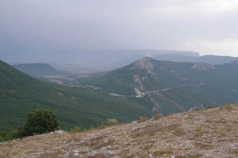 a scenic view of mountains in the distance