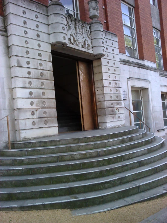 stone steps leading to a building with a doorway