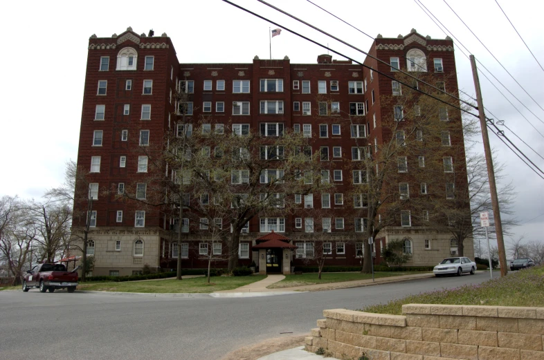 the building at the corner has many windows