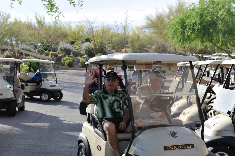 the golf carts are being used by two men