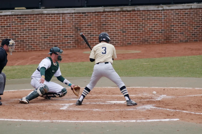 a baseball player is getting ready to swing his bat