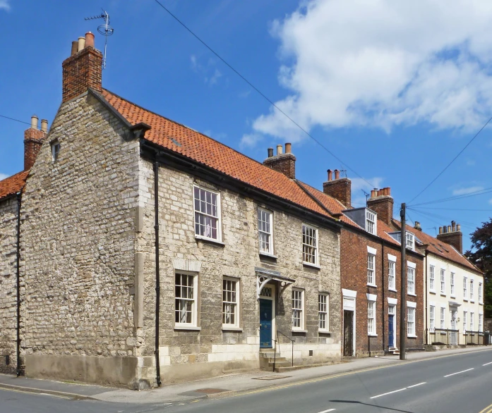 houses on the corner of a street with no cars