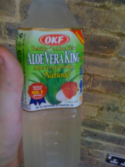 a small bottle of aloe veraking liquid