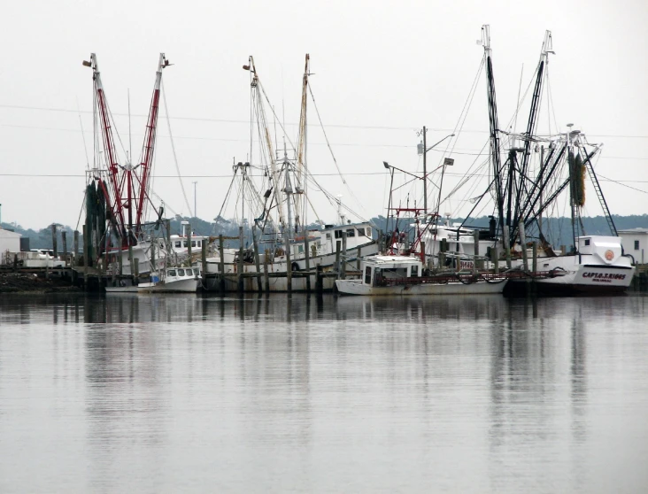 some boats in a large body of water