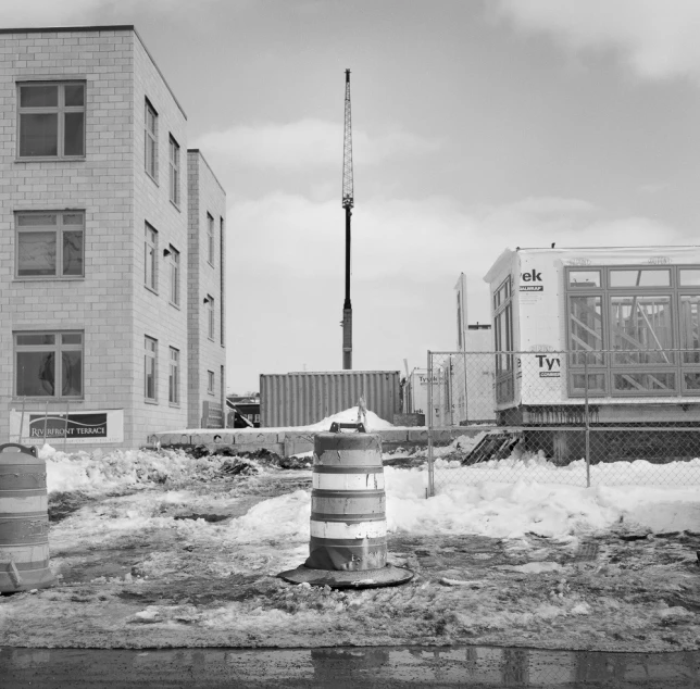 some buildings in the background on a cold winter day