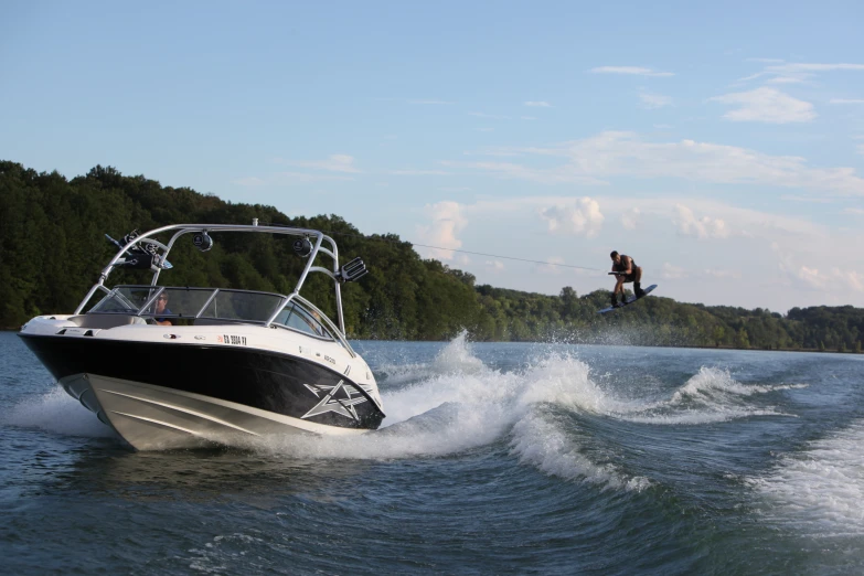 a motorboat being pulled by water skiers