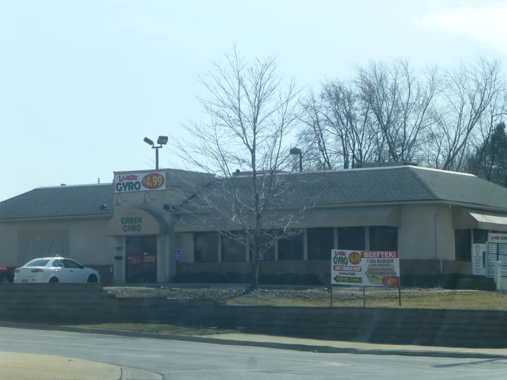 a gas station sits empty on a cloudy day