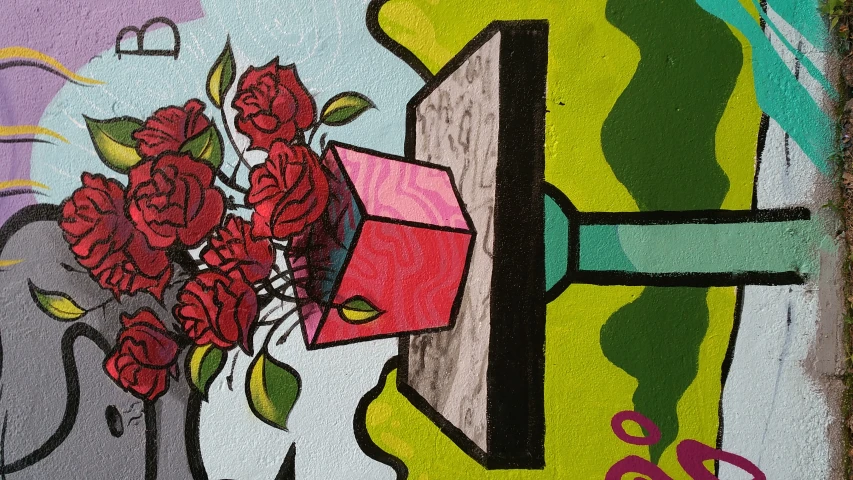 an artistic mural shows flowers in a box on a table