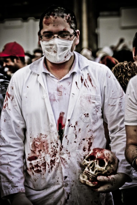 a man wearing a face mask and wearing glasses