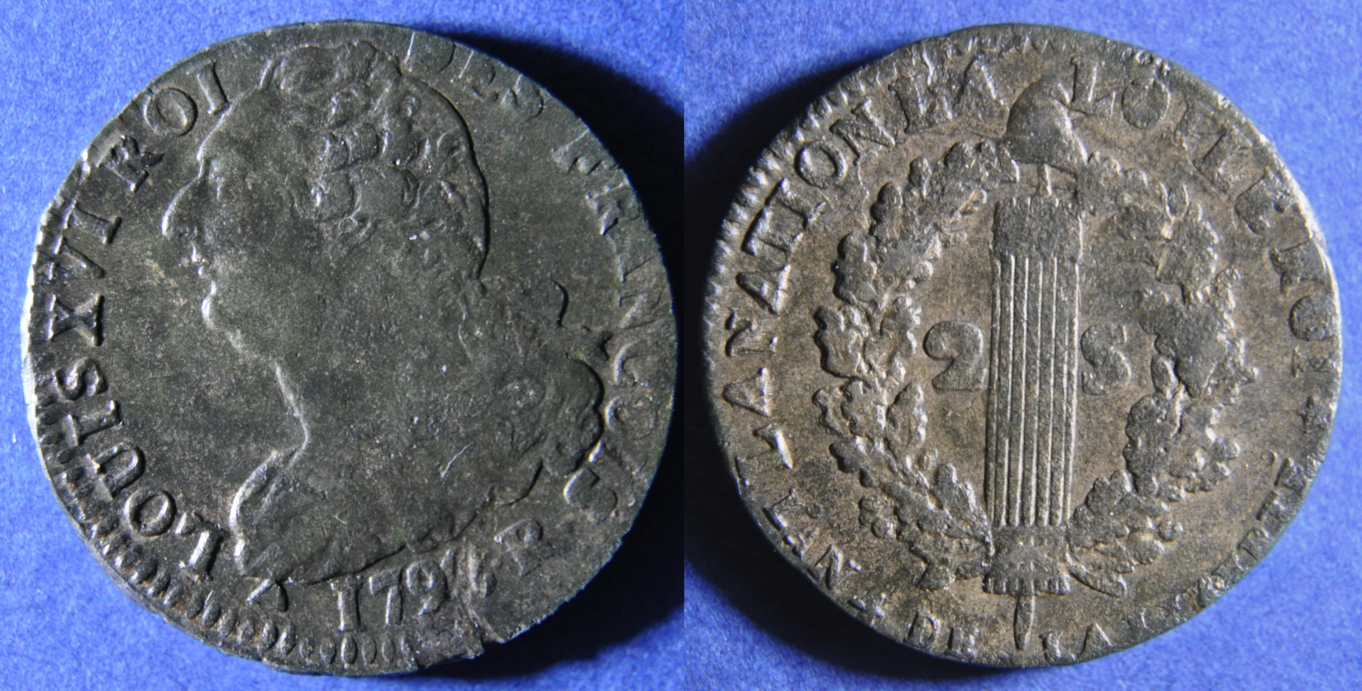 a picture of two ancient coins of different types