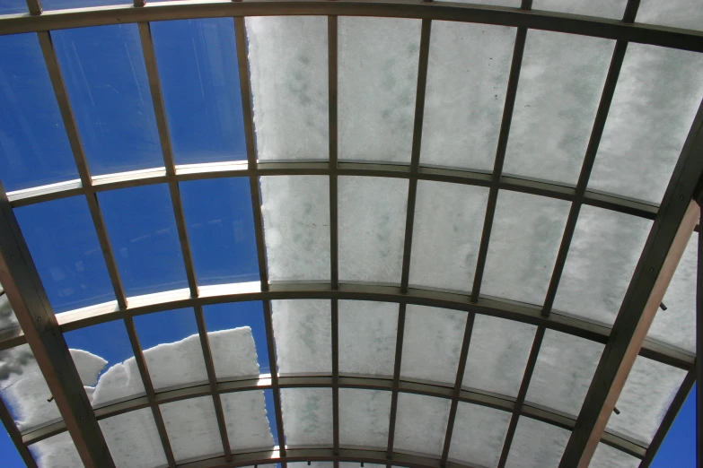 a very large building with some kind of ceiling made of ice