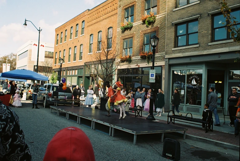 there is a band playing outside on the street