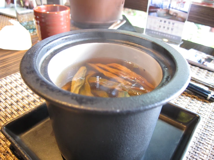 a soup in a pot on the table