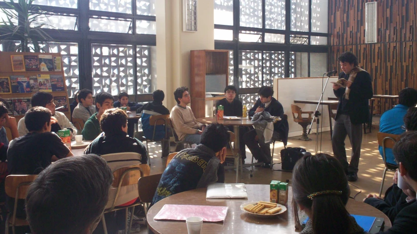 a group of people sitting in a room