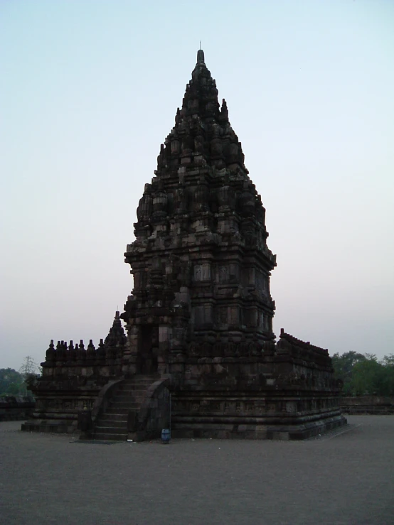 an image of a large temple with many statues