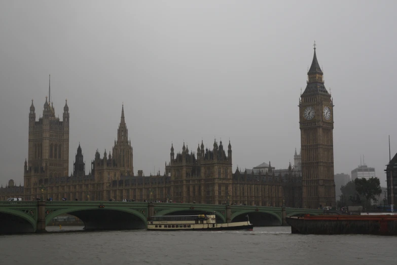 big ben in london, england during the cloudy weather