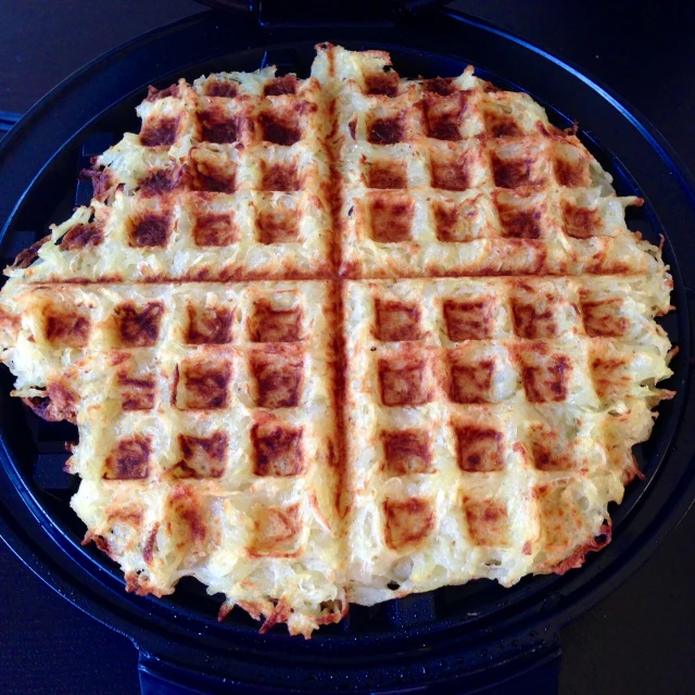 this is a waffle cooked in a black pan