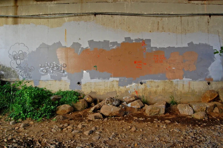 an abandoned building is covered in wall graffiti