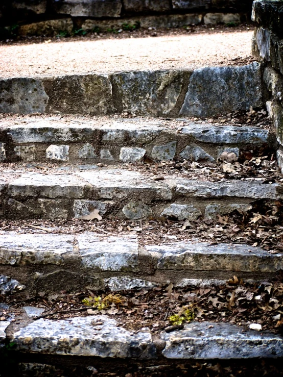 stone steps with a bench behind them