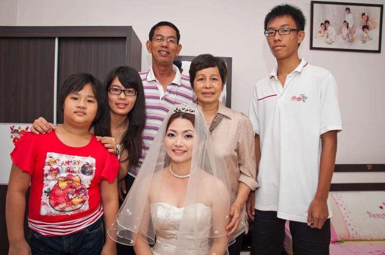 a family standing in a room together