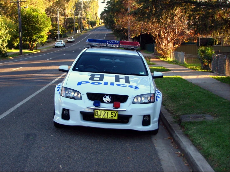 a police car parked on the side of the road