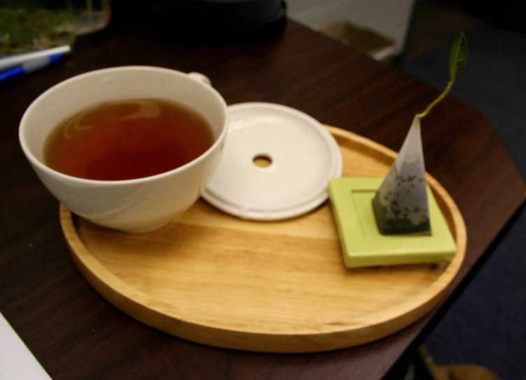there is tea and some items on this table