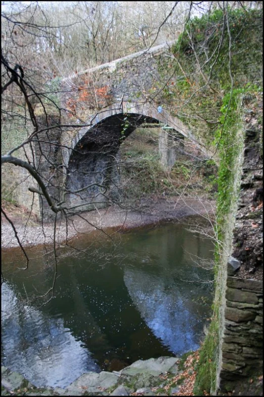 a small bridge over a body of water