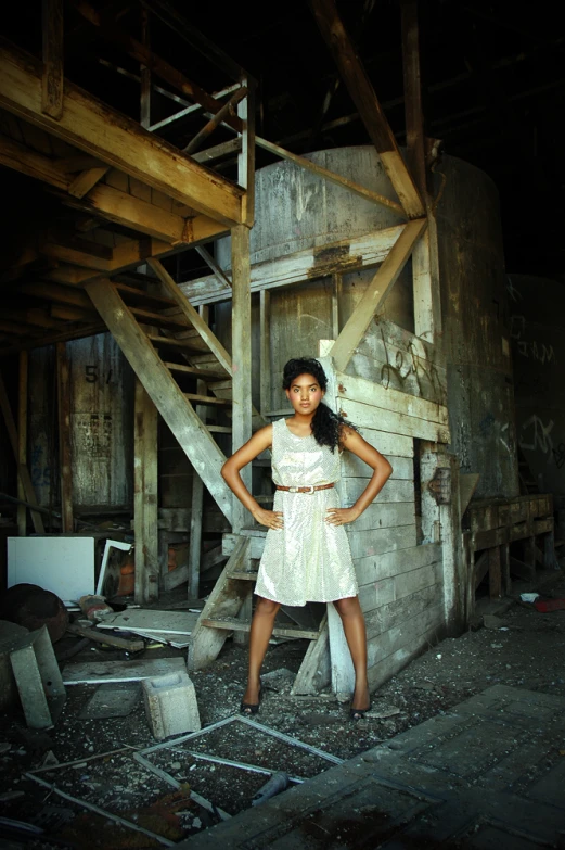 a woman in white poses for a po