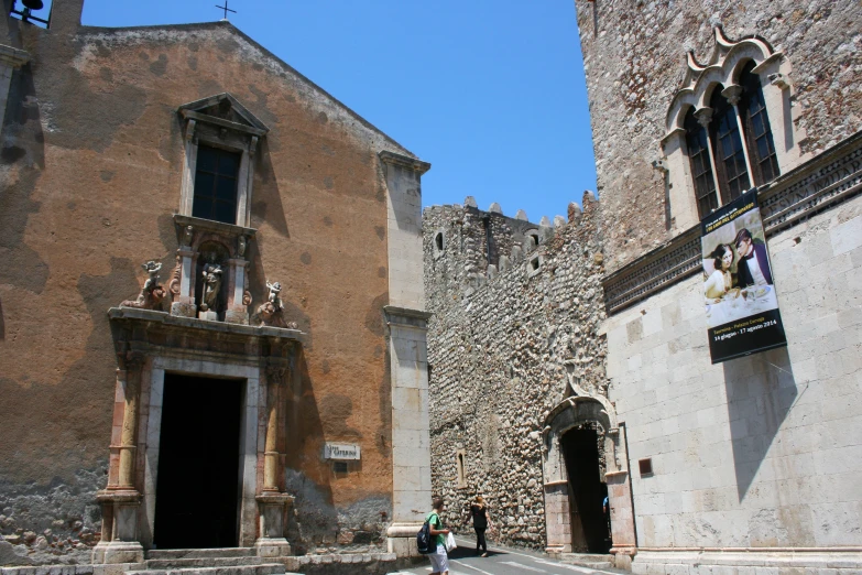 two buildings next to each other on a street