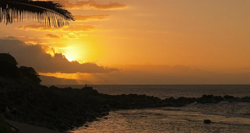 a beautiful sunset on a tropical beach in costa rica