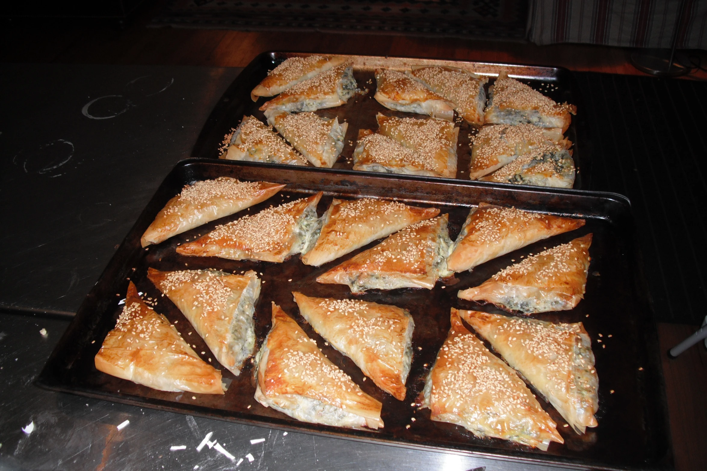 several pastries in pans ready to be served