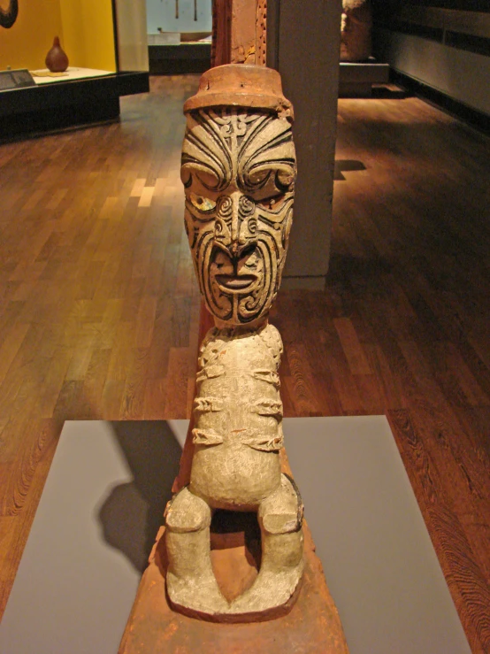 a statue on display in a museum