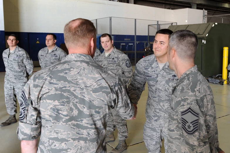 a group of military men standing next to each other